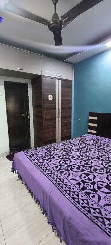 Bedroom in 2 BHK Apartment at Om Balaji Kripa CHS, Nerul Sector 19 – for Rent
