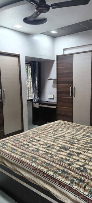 Bedroom in 2 BHK Apartment at Om Balaji Kripa CHS, Nerul Sector 19 – for Rent