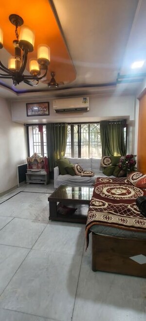 Living Room in 2 BHK Apartment at Om Balaji Kripa CHS, Nerul Sector 19 – for Rent