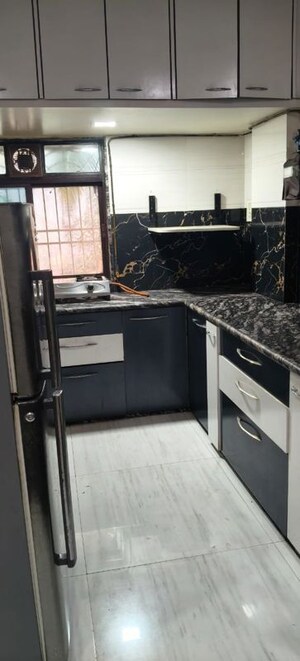 Kitchen in 2 BHK Apartment at Om Balaji Kripa CHS, Nerul Sector 19 – for Rent