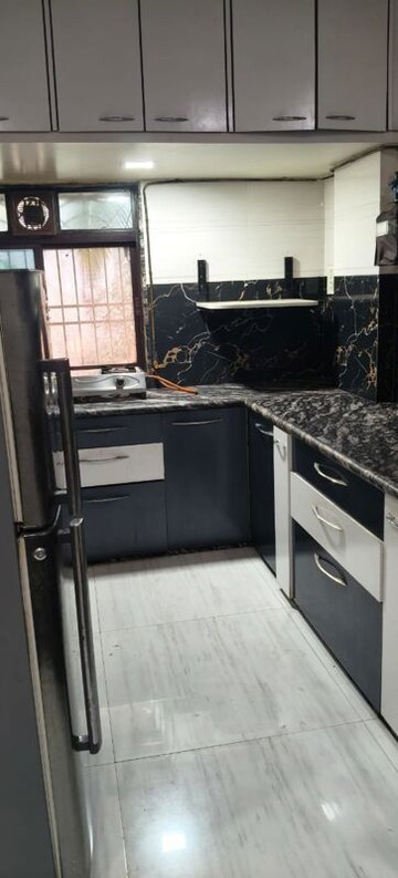 Kitchen in 2 BHK Apartment at Om Balaji Kripa CHS, Nerul Sector 19 – for Rent