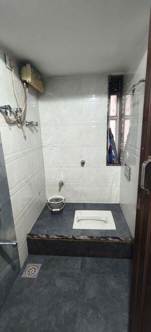 Bathroom in 2 BHK Apartment at Om Balaji Kripa CHS, Nerul Sector 19 – for Rent