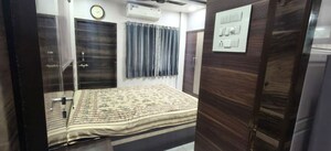 Bedroom in 2 BHK Apartment at Om Balaji Kripa CHS, Nerul Sector 19 – for Rent