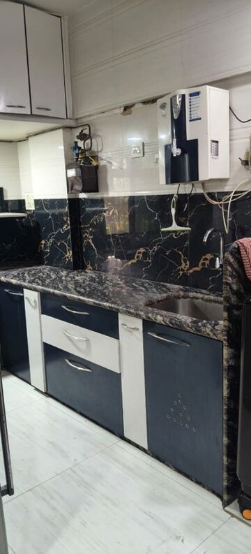 Kitchen in 2 BHK Apartment at Om Balaji Kripa CHS, Nerul Sector 19 – for Rent