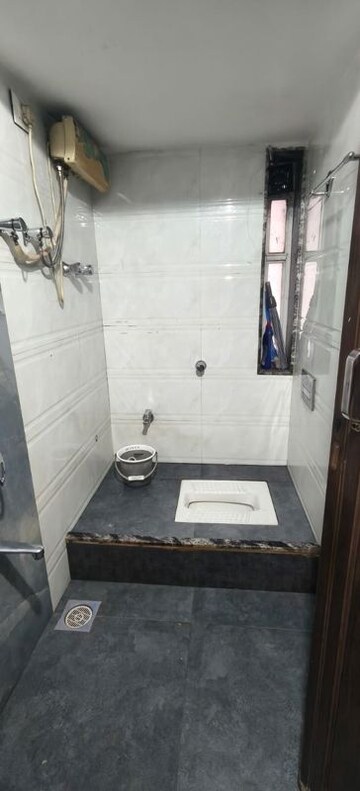 Master Bedroom in 2 BHK Apartment at Om Balaji Kripa CHS, Nerul Sector 19 – for Rent