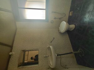 Bathroom in 2 BHK Apartment at Kalpataru Yugdharma, Malad West – for Rent