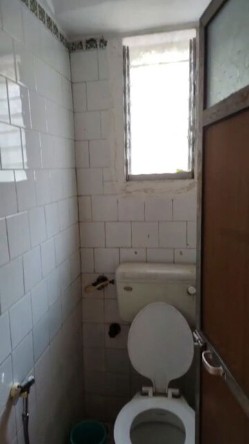 Bathroom in 1 BHK Apartment at Nirlon Family CHS, Malad West – for Rent