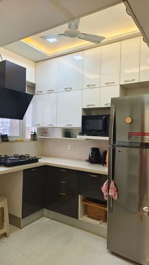 Kitchen in 2 BHK Apartment at Rosa Bella, Ghodbunder Road – for Rent
