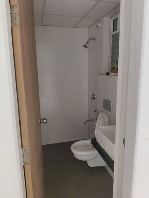Bathroom in 1 BHK Apartment at VR Bhoomi Acres F Wing, Ghodbunder Road – for Rent