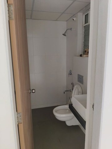 Bathroom in 1 BHK Apartment at VR Bhoomi Acres F Wing, Ghodbunder Road – for Rent