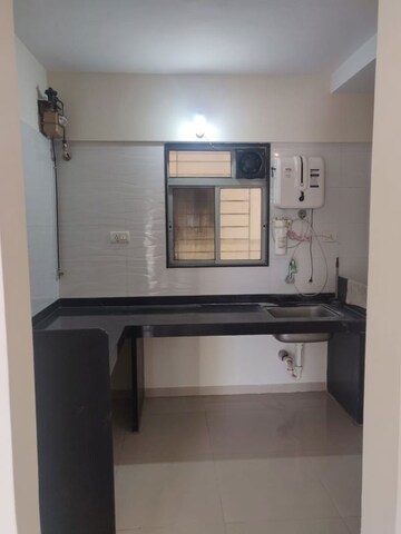 Kitchen in 2 BHK Apartment at Amit Astonia Classic, Undri – for Sale