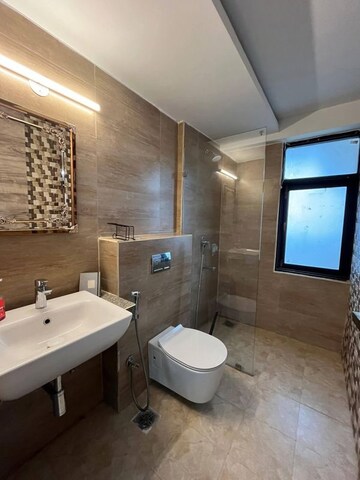 Bathroom in 3 BHK Apartment at Maxxus Elanza, International Airport Road – for Rent