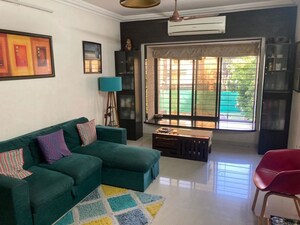 Living Room in 2 BHK Apartment at Gulmarg Society, Chembur – for Sale