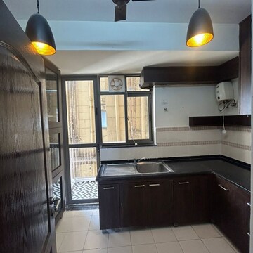 Kitchen in 3 BHK Apartment at Unitech Uniworld Gardens 2, Malibu Town – for Rent