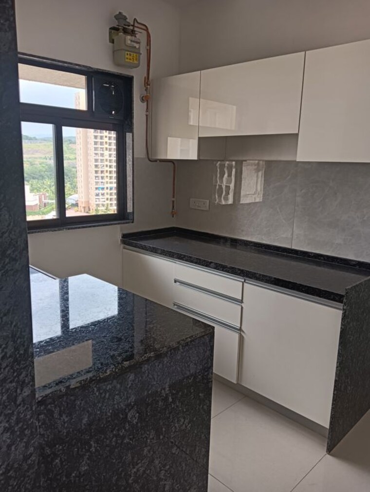 Kitchen, lalani-valentine-apartment-1-wing-d 1 Bedroom 405 Sq.Ft. Apartment In Malad East Mumbai 10025485