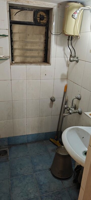 Bathroom in 1.5 BHK Apartment at Mahim West – for Sale