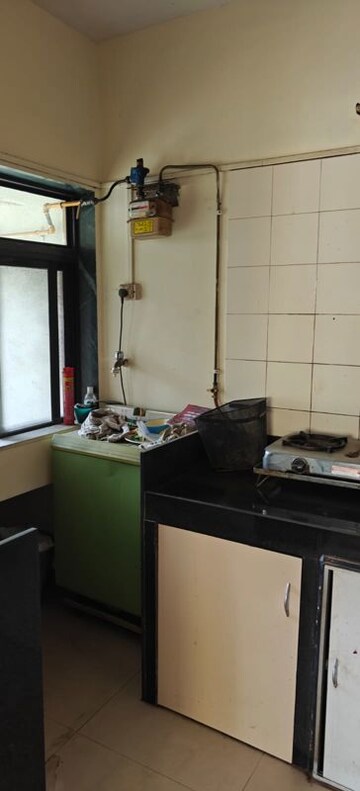 Kitchen in 1.5 BHK Apartment at Mahim West – for Sale