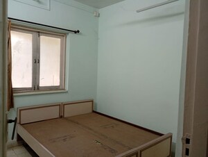 Bedroom in 2 BHK Apartment at Ram Janki Apartment, Vile Parle East – for Rent