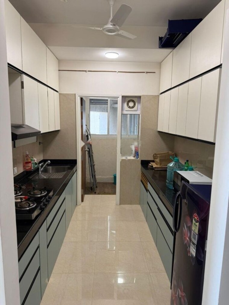 Kitchen, lnt-crescent-bay-t3 2 Bedroom 804 Sq.Ft. Apartment In Parel Mumbai 10025483