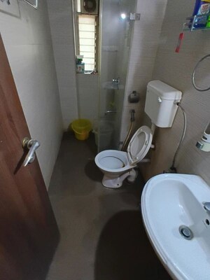 Bathroom in 3 BHK Apartment at Lokhandwala Whispering Palms, Kandivali East – for Rent