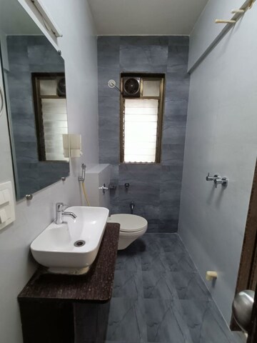 Bathroom in 3 BHK Apartment at Asmita Sand Dunes, Malad West – for Sale