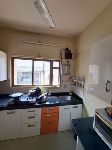 Kitchen in 2 BHK Apartment at Little Hut Apartment, Bandra West – for Rent