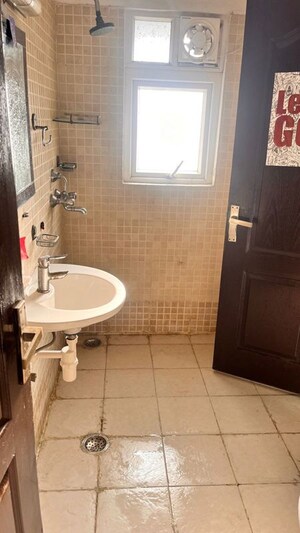 Bathroom in 3 BHK Apartment at Aditya Urban Casa, Sector 78 – for Sale