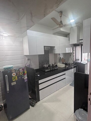 Kitchen in 1 BHK Apartment at Lokhandwala Whispering Palms, Kandivali East – for Rent