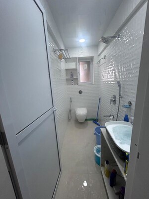 Bathroom in 1 BHK Apartment at Lokhandwala Whispering Palms, Kandivali East – for Rent