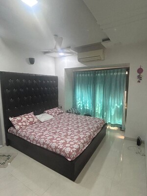 Bedroom in 1 BHK Apartment at Lokhandwala Whispering Palms, Kandivali East – for Rent