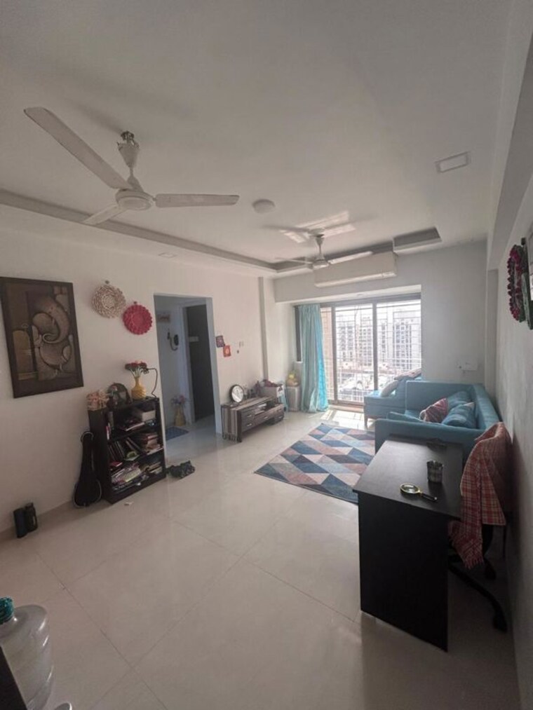 Living Room, lokhandwala-whispering-palms 1 Bedroom 450 Sq.Ft. Apartment In Kandivali East Mumbai 10025793