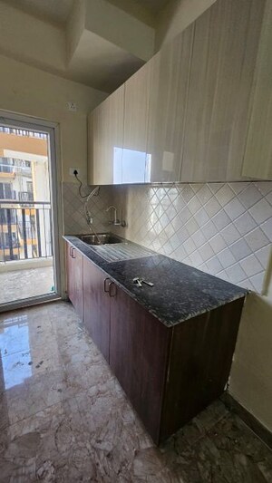 Kitchen in 2 BHK Apartment at Amrapali Golf Homes, Sector 4 Greater Noida – for Sale