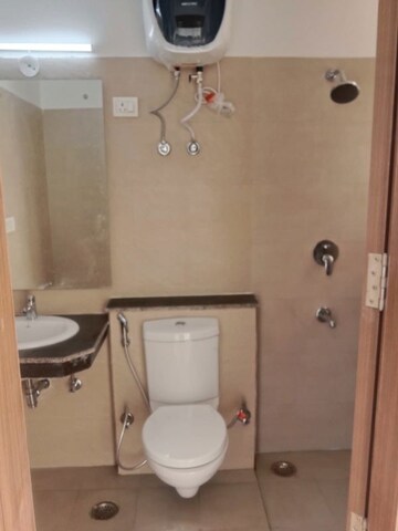 Bathroom in 3 BHK Apartment at ATS Homekraft Pious Hideaways, Sector 150 – for Rent