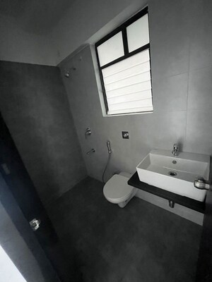 Bathroom in 2 BHK Apartment at Roshan Milestone, Tathawade – for Rent