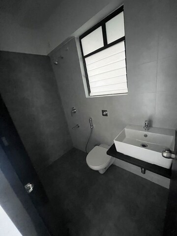 Bathroom in 2 BHK Apartment at Roshan Milestone, Tathawade – for Rent
