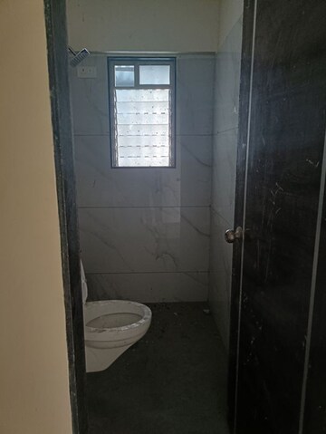Bathroom in 2 BHK Apartment at Dahisar Rajhans, Dahisar East – for Sale