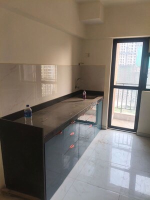 Kitchen in 3 BHK Apartment at Runwal Gardens, Dombivli East – for Rent