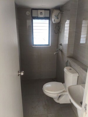 Bathroom in 3 BHK Apartment at Runwal Gardens, Dombivli East – for Rent
