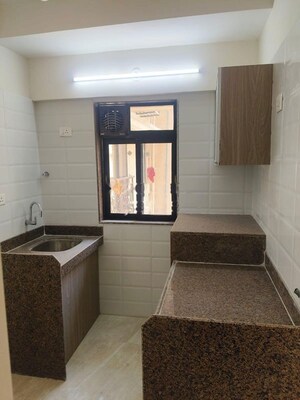 Kitchen in 1.5 BHK Apartment at Chandiwala Pearl Heaven, Andheri East – for Rent