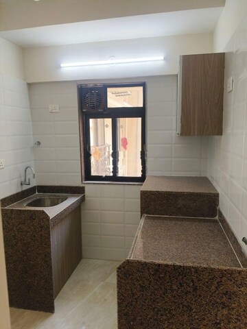 Kitchen in 1.5 BHK Apartment at Chandiwala Pearl Heaven, Andheri East – for Rent