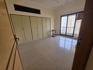 Room in 2 BHK Apartment at Raheja Interface Heights, Malad West – for Rent