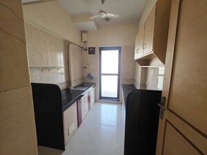 Kitchen in 2 BHK Apartment at Raheja Interface Heights, Malad West – for Rent