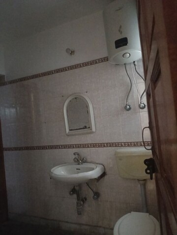 Bathroom in 3 BHK Builder Floor at Jubilee Apartments, Sector 15 – for Rent
