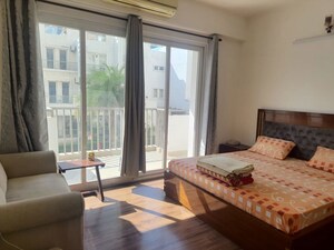 Bedroom in 3.5 BHK Apartment at Emaar MGF The Palm Drive Villas, Sector 66 – for Rent