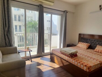 Bedroom in 3.5 BHK Apartment at Emaar MGF The Palm Drive Villas, Sector 66 – for Rent