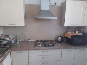 Kitchen in 3.5 BHK Apartment at Emaar MGF The Palm Drive Villas, Sector 66 – for Rent