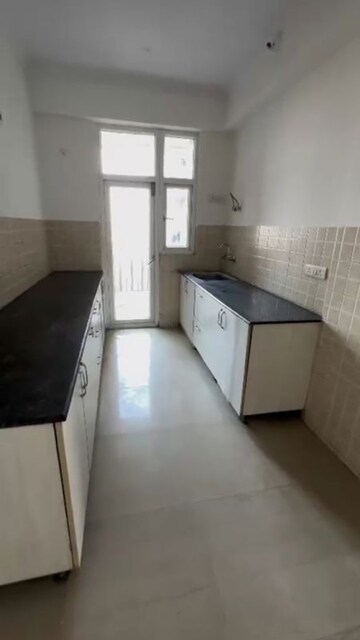 Kitchen in 2 BHK Apartment at Saviour Greenisle, Sain Vihar – for Sale