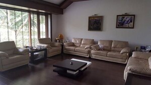 Living Room in 5 BHK Villa at Hollywood Town, International Airport Road – for Sale