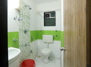 Bathroom in 4 BHK Apartment at Vile Parle East – for Rent