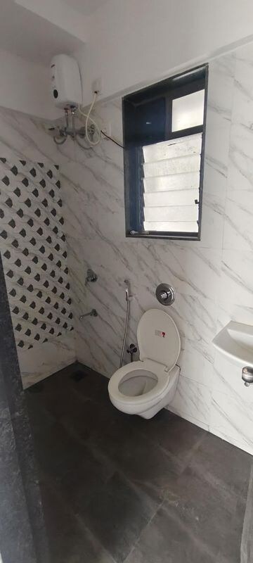 Bathroom in 1 BHK Apartment at UK Iridium, Kandivali East – for Rent